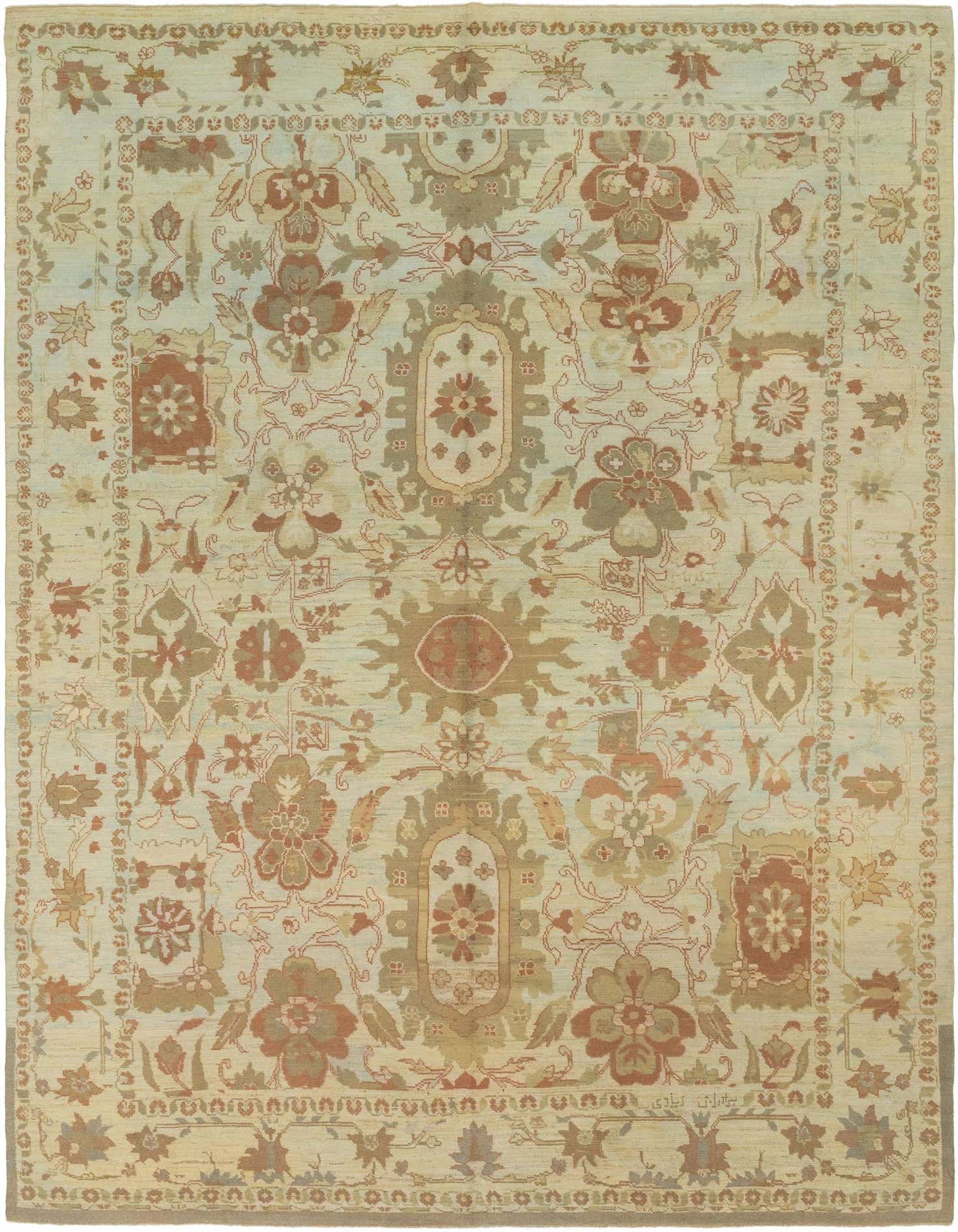 A large 12x16 rectangular Oushak rug in light blue with traditional botanical and tribal patterns in muted terracotta, beige, and sage.