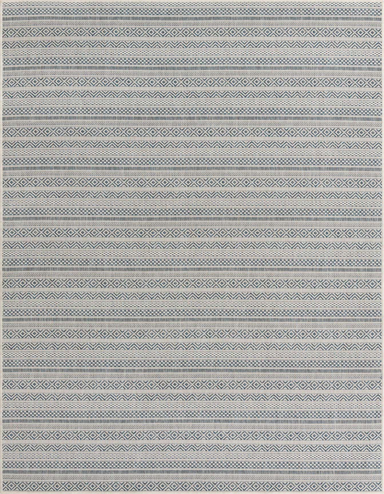 A 6x9 rectangular light blue and off-white tribal patterned flatweave rug, suitable for indoor or outdoor spaces.