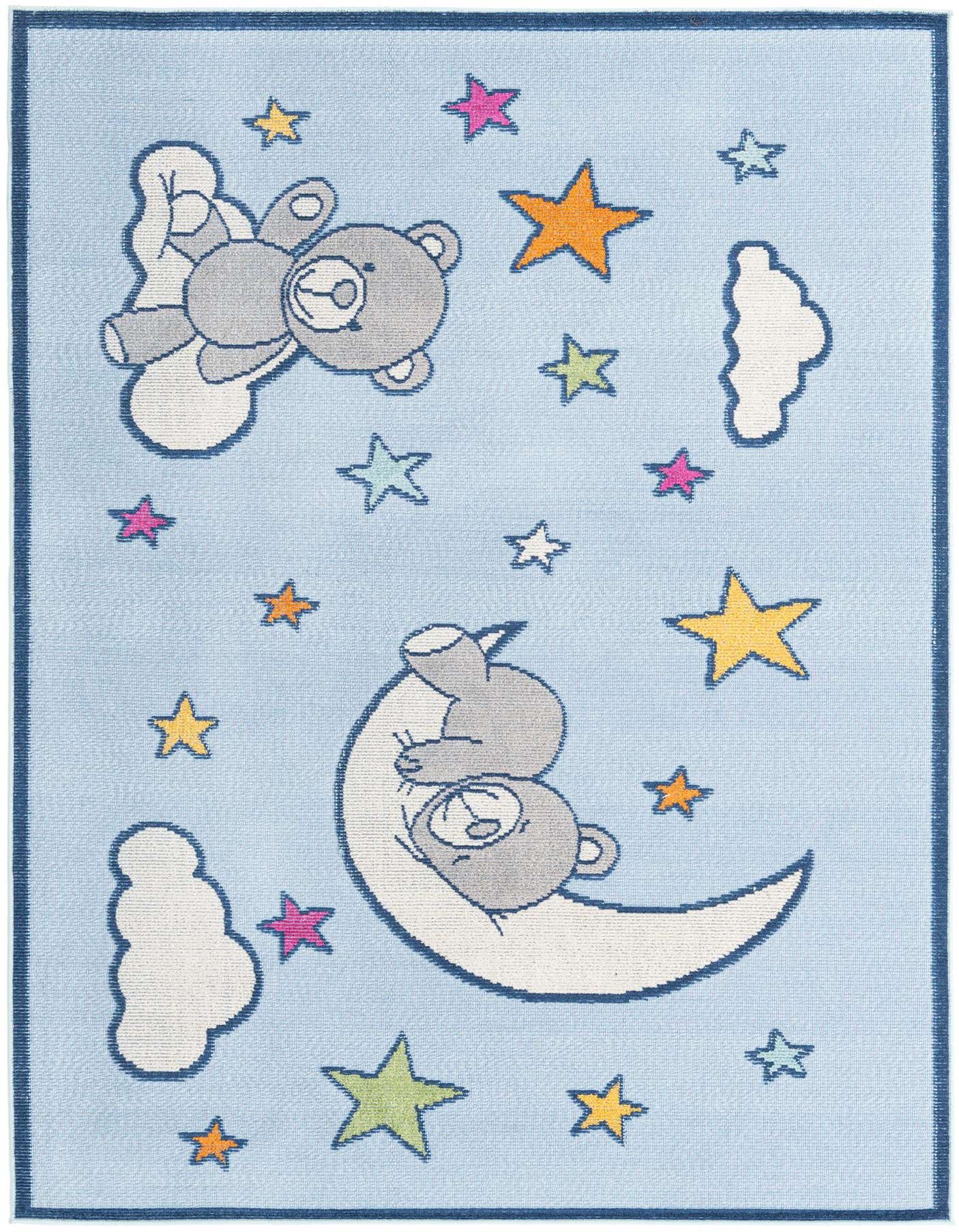 A light blue rectangular rug with a playful pattern of gray teddy bears, white clouds, and colorful stars.