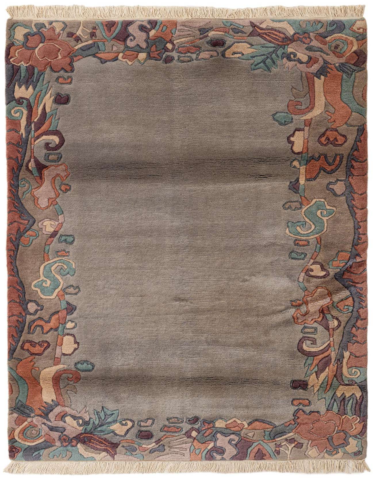 A 4x6 rectangular light blue wool rug with a colorful abstract border featuring floral and swirling patterns in blues, oranges, and purples.