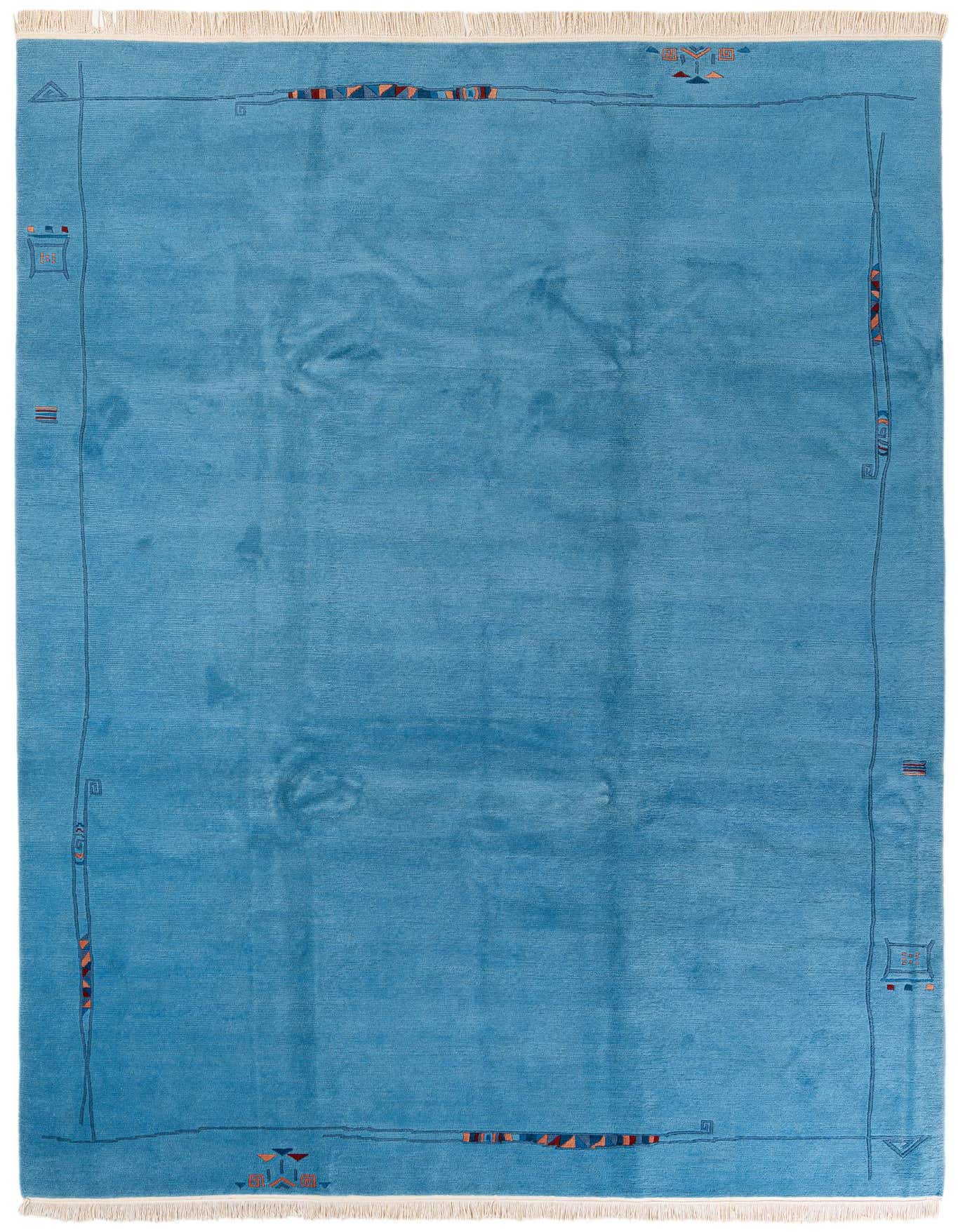 A large 8x11 rectangular light blue wool rug with a subtle modern abstract border featuring small geometric shapes in red, orange, and dark blue, suitable for a living room.