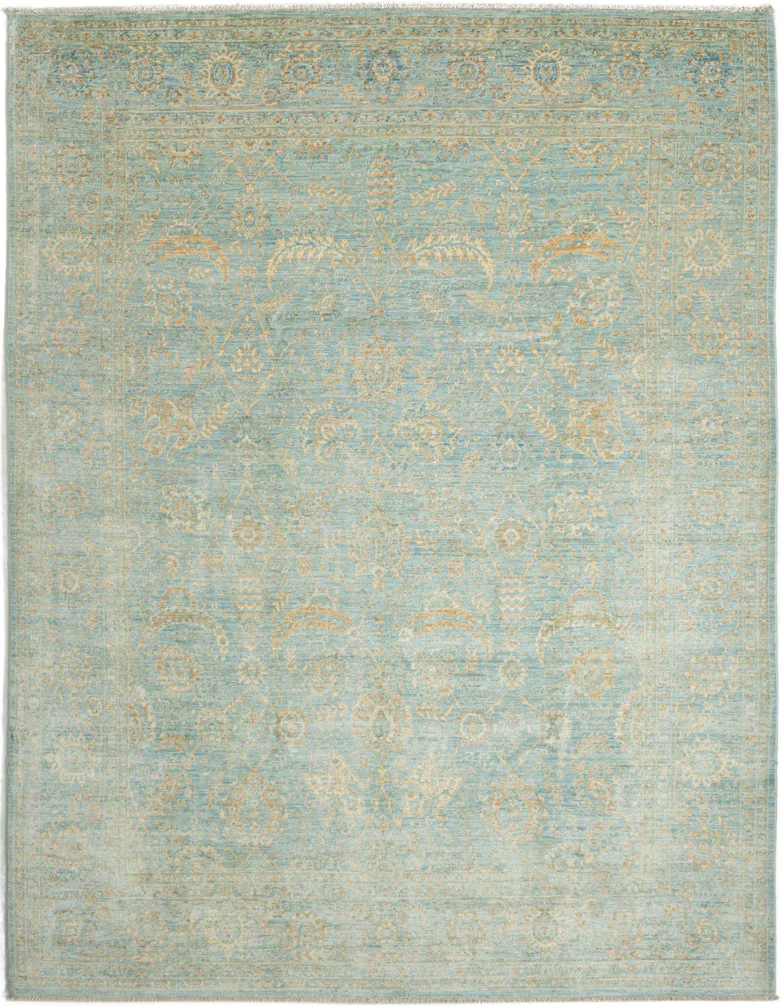 A handmade rectangular Ziegler rug in light blue and gold, featuring an intricate Persian floral pattern.