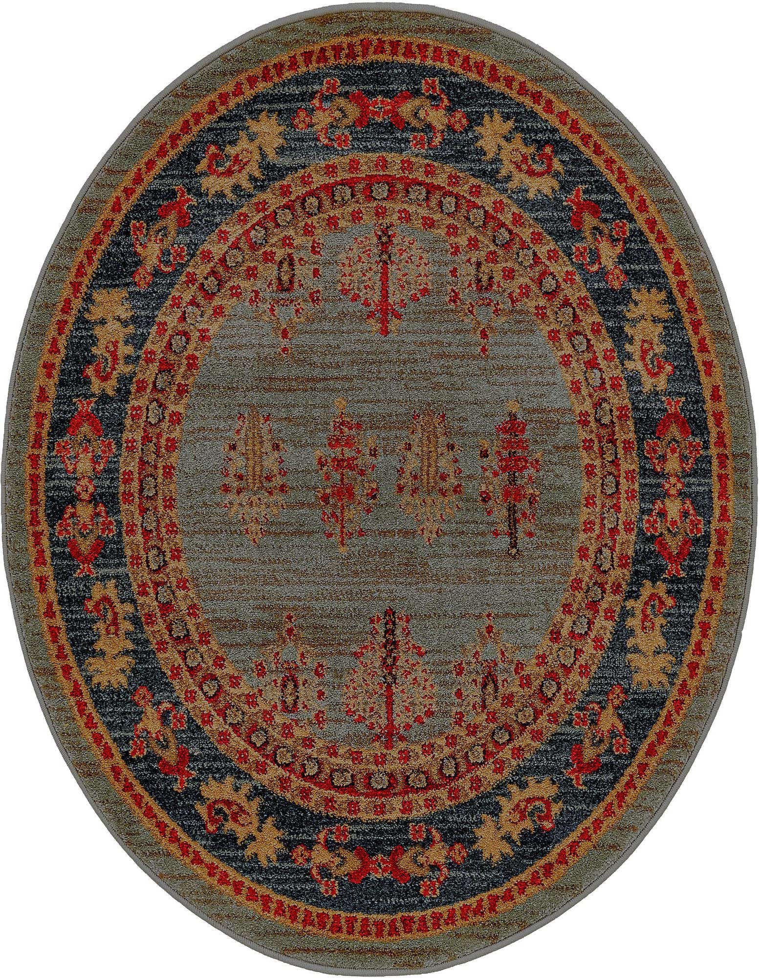 A 3' round light blue rug with a distressed botanical and tribal pattern in red, gold, and dark blue.