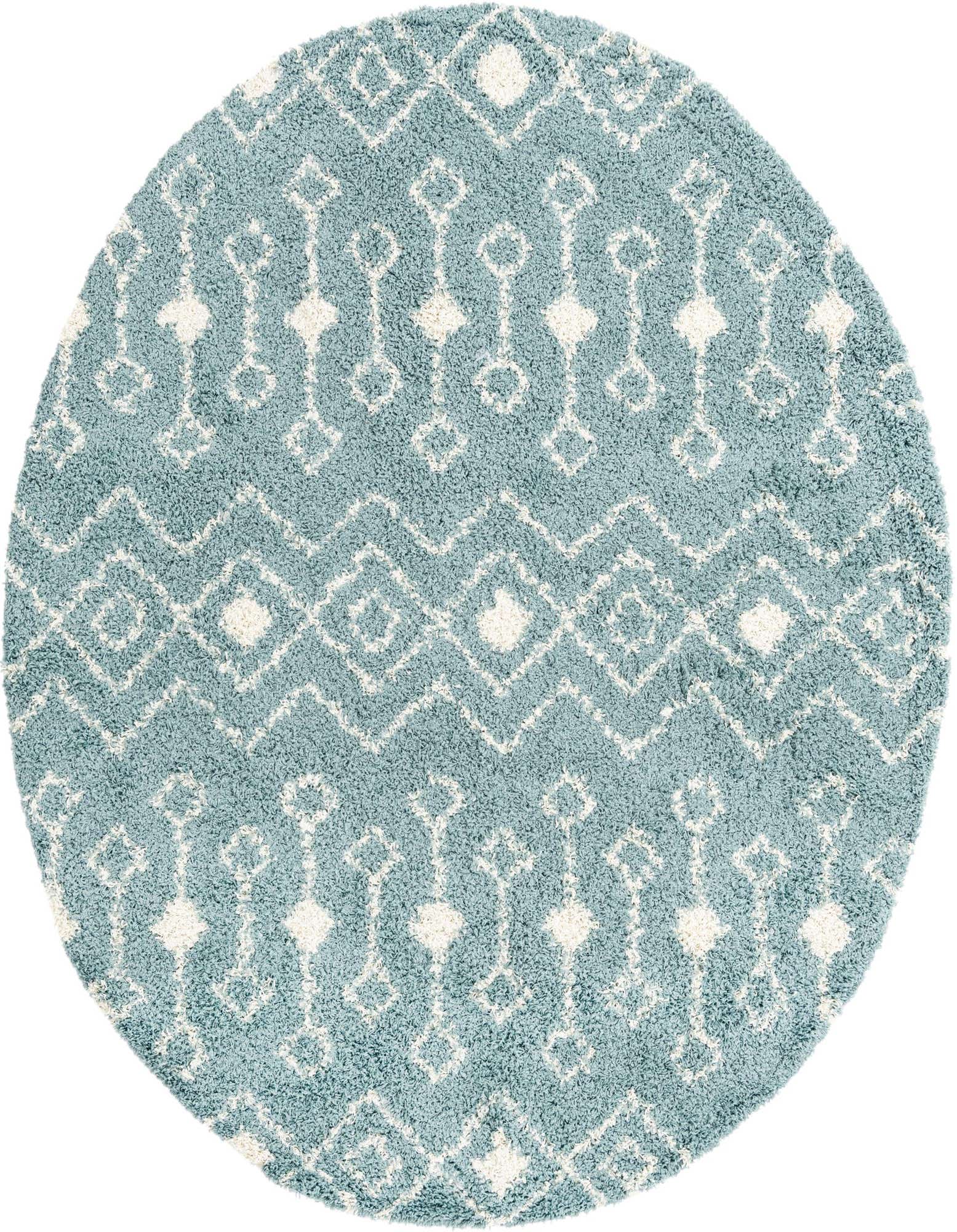 A round 7' 10 x 7' 10 light blue shag rug with a white tribal geometric pattern, suitable for a modern living space.