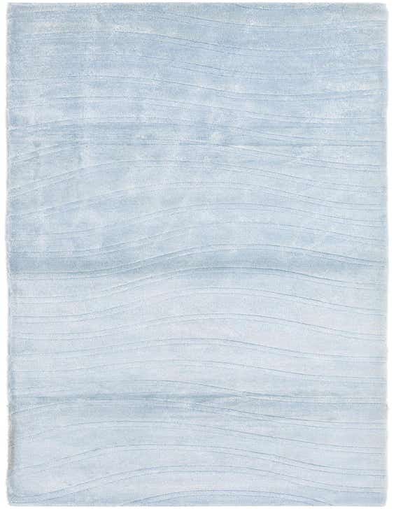 A light blue 10 ft runner rug with a modern wavy pattern, made of wool and cotton, ideal for a hallway.