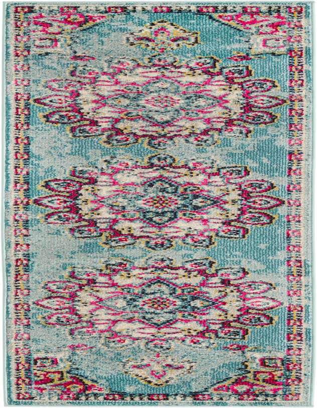 A 7 ft runner rug in light blue with a distressed bohemian medallion pattern in pink, yellow, and navy.