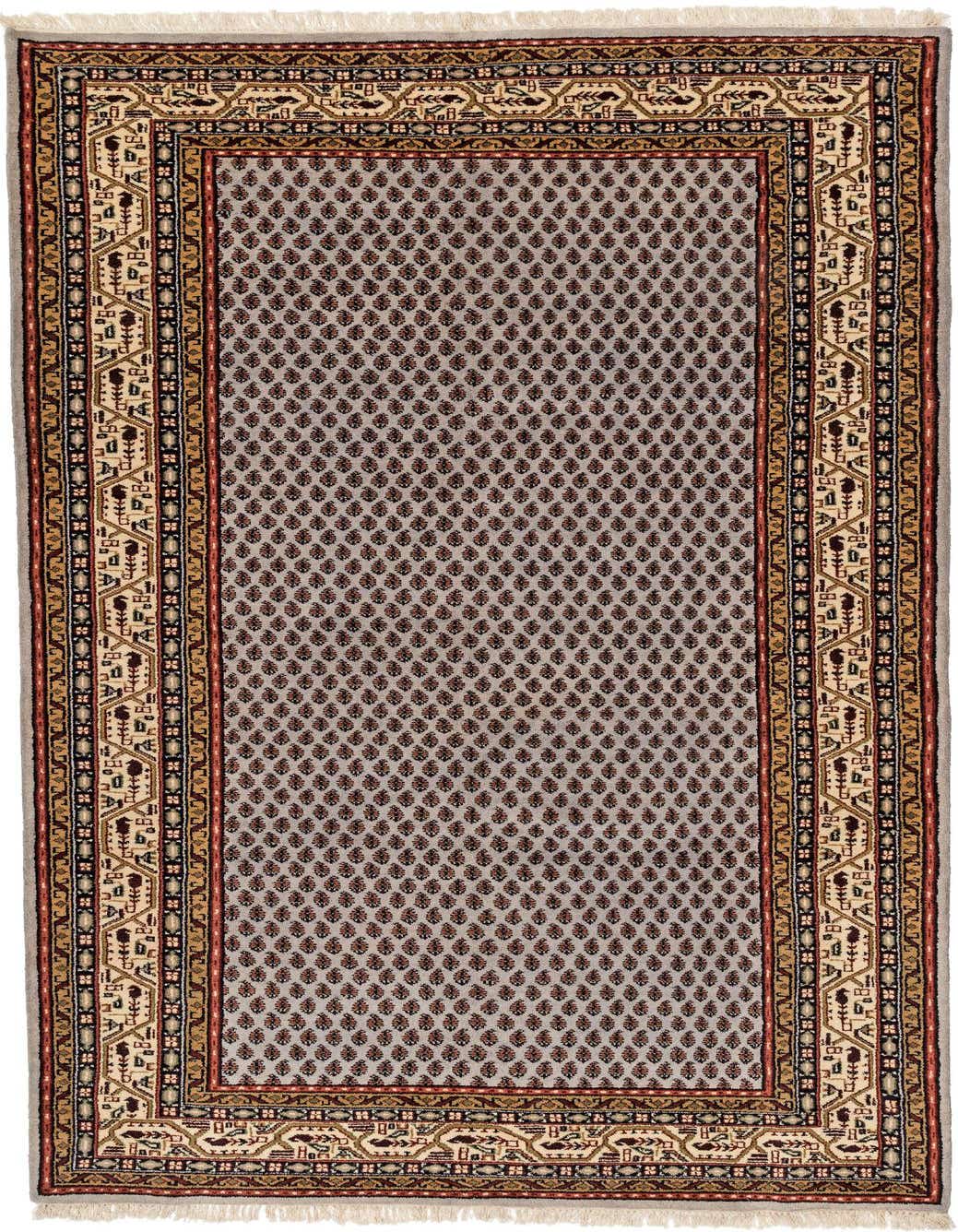 A 10 ft runner rug in light blue with a repeating floral pattern and a detailed traditional border, suitable for a hallway.