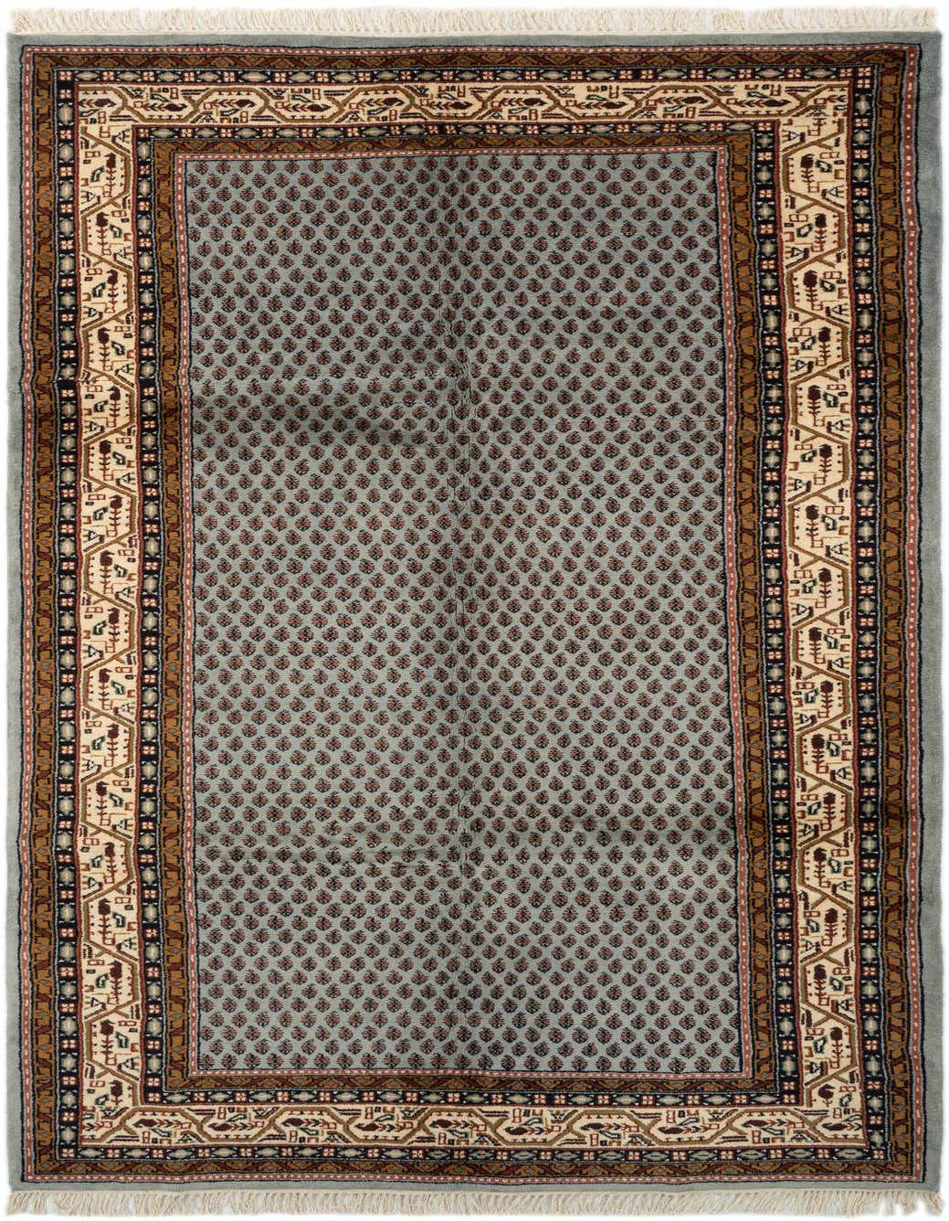 A 10 ft runner rug in light blue with a traditional border pattern, featuring small red and brown motifs.