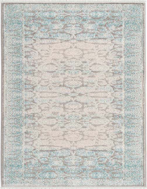 A 10 ft runner rug in a distressed medallion pattern with shades of light blue, gray, and cream, ideal for a hallway.