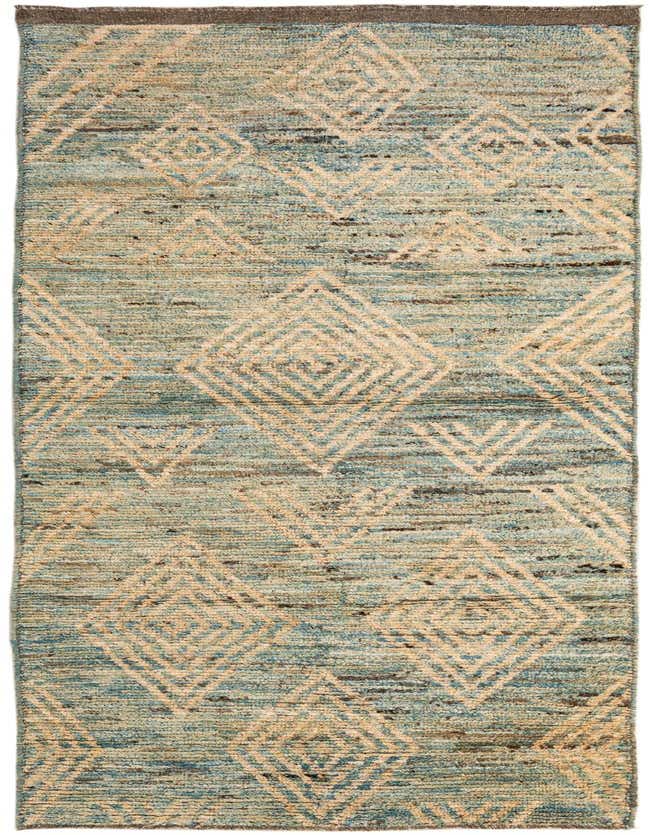 A 10 ft runner rug in shades of blue and natural beige, featuring a tribal geometric diamond pattern, ideal for a hallway.