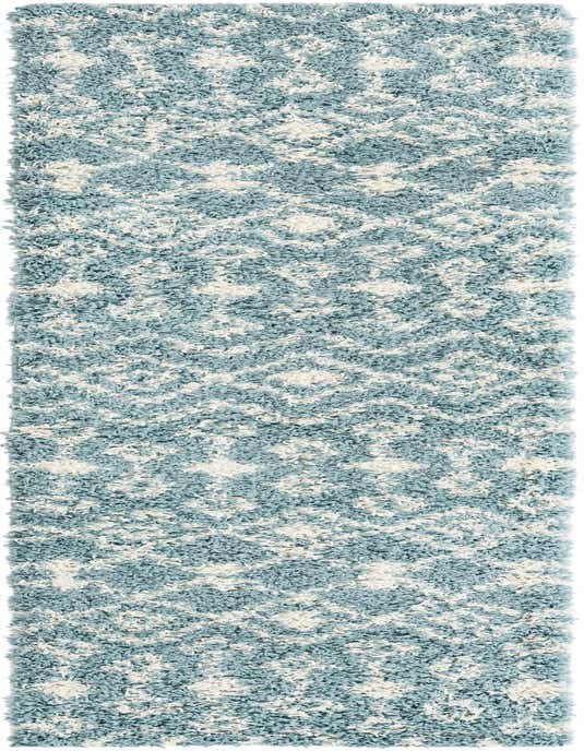 A light blue and cream Moroccan Trellis Shag runner rug with a tribal pattern, perfect for a hallway.
