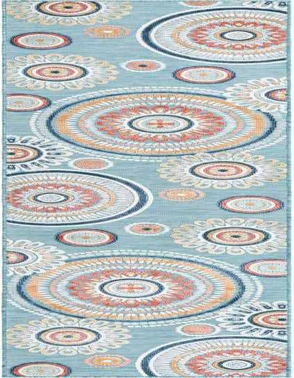 A light blue 12 ft runner rug featuring large and small abstract medallion patterns in coral, orange, navy, and white.