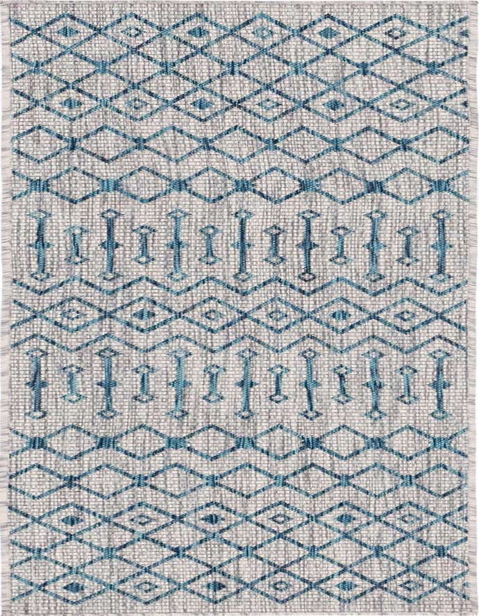 A 6 ft runner rug featuring a light blue and white tribal geometric pattern, suitable for indoor or outdoor use.