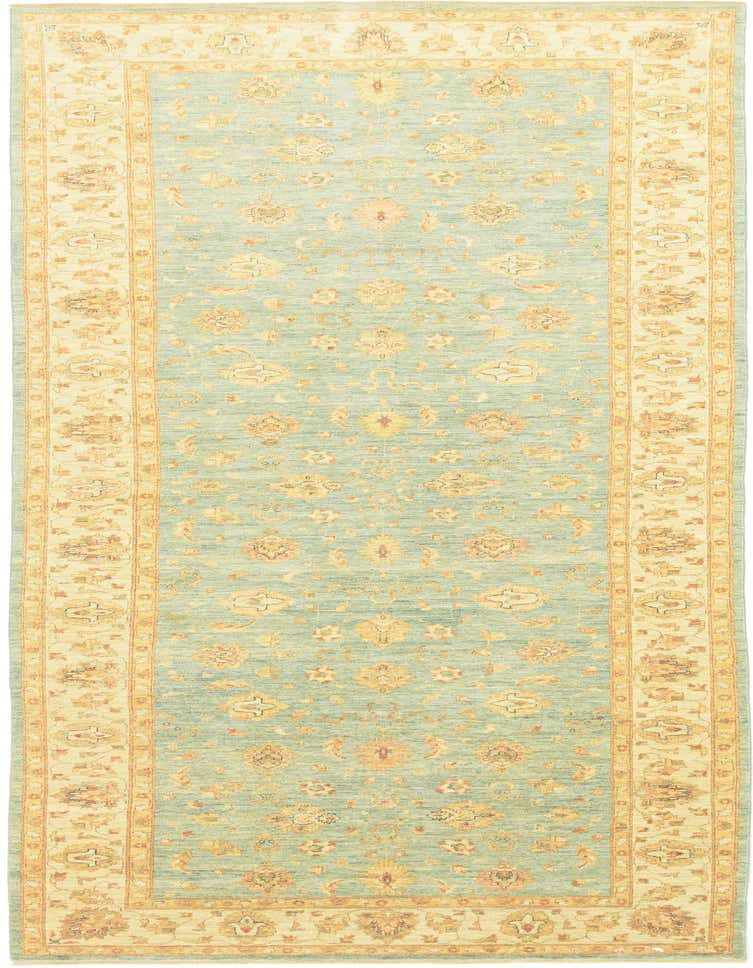 A 16 ft runner rug with a light blue field and a cream border, featuring traditional botanical and tribal patterns in gold and orange tones.