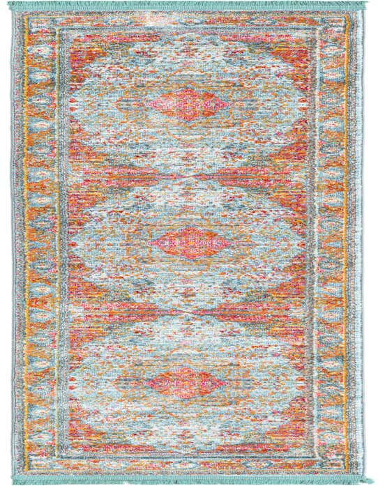 A light blue and orange distressed traditional runner rug with a medallion pattern and teal fringe, ideal for a hallway or kitchen.