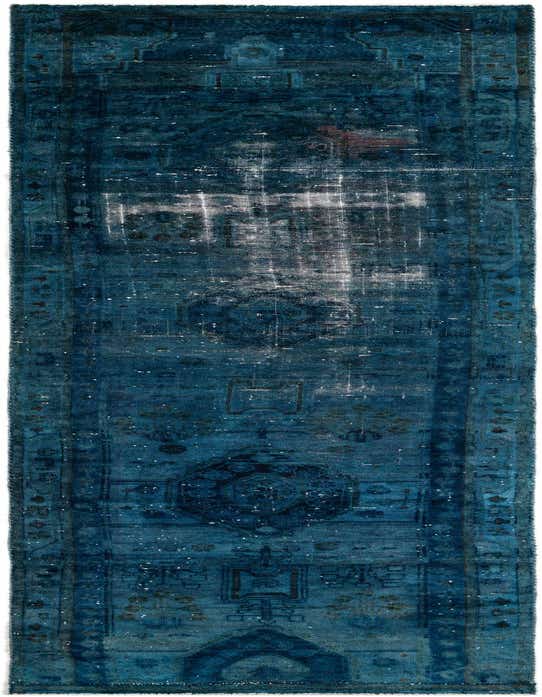A 13 ft runner rug in shades of blue with a distressed Persian pattern, ideal for a hallway.