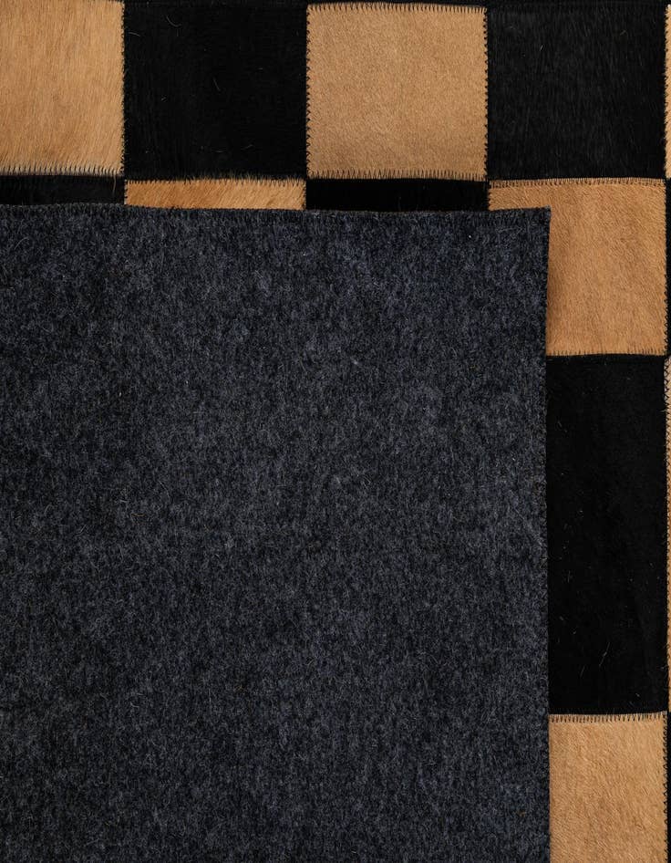 Detail image of  5' 2 x 7' 11 Cowhide - Patchwork Rug