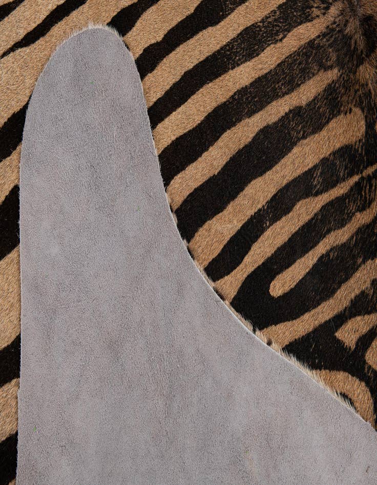 Detail image of  6' 6 x 6' 9 Cowhide Leather Freeform Rug