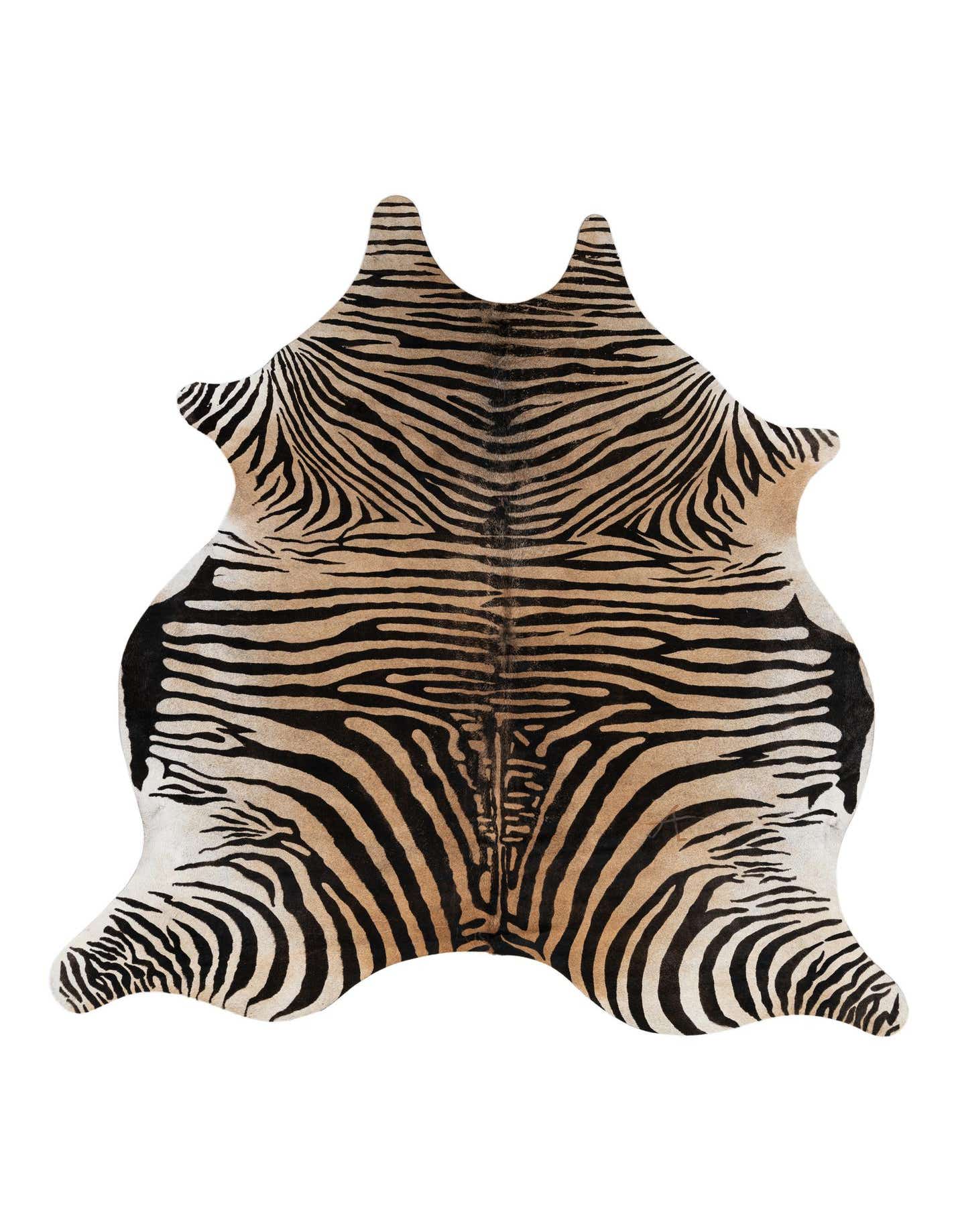 A freeform cowhide rug featuring a striking zebra print pattern in shades of brown and tan, perfect for an indoor living space.