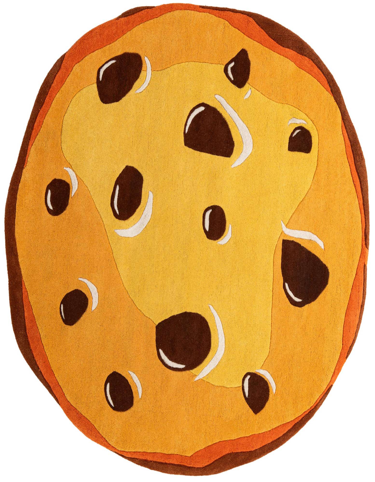 A round, freeform rug designed like a giant chocolate chip cookie, featuring shades of tan and brown with dark brown 'chocolate chips' and white accents, perfect for a playful kids' room.