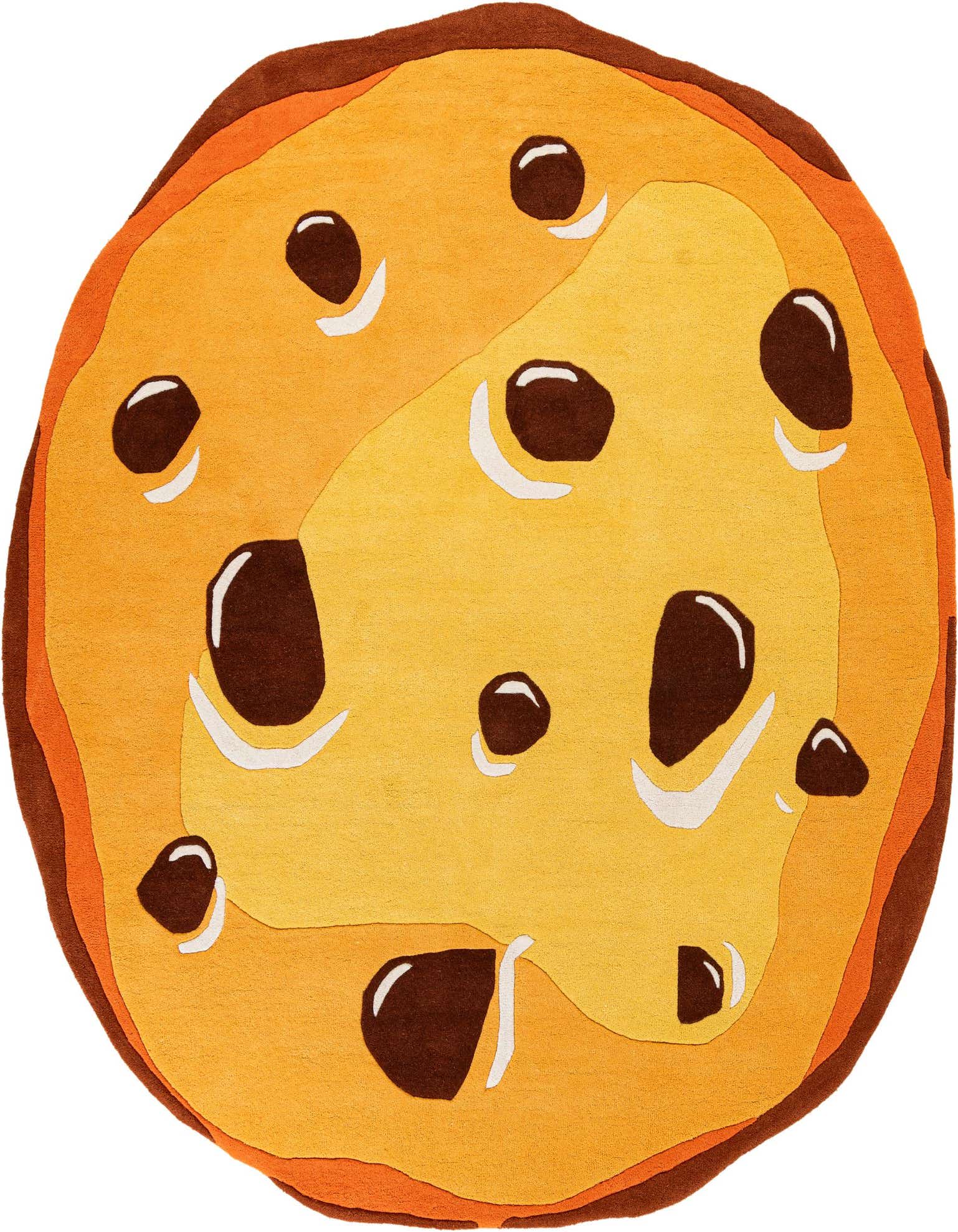 A large, round, freeform rug designed to look like a chocolate chip cookie, featuring shades of tan, brown, and white.