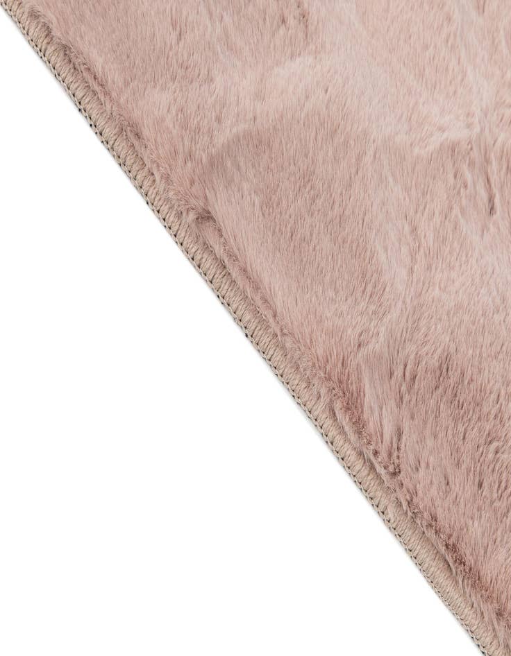 Detail image of  5' 1 x 6' 11 Carved Solid Rabbit Rug