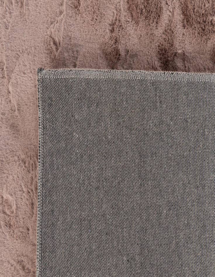 Detail image of  5' 1 x 6' 11 Carved Solid Rabbit Rug