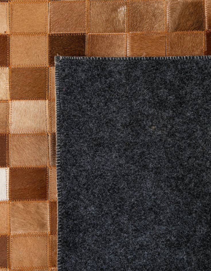 Detail image of  5' x 7' 11 Cowhide - Patchwork Rug