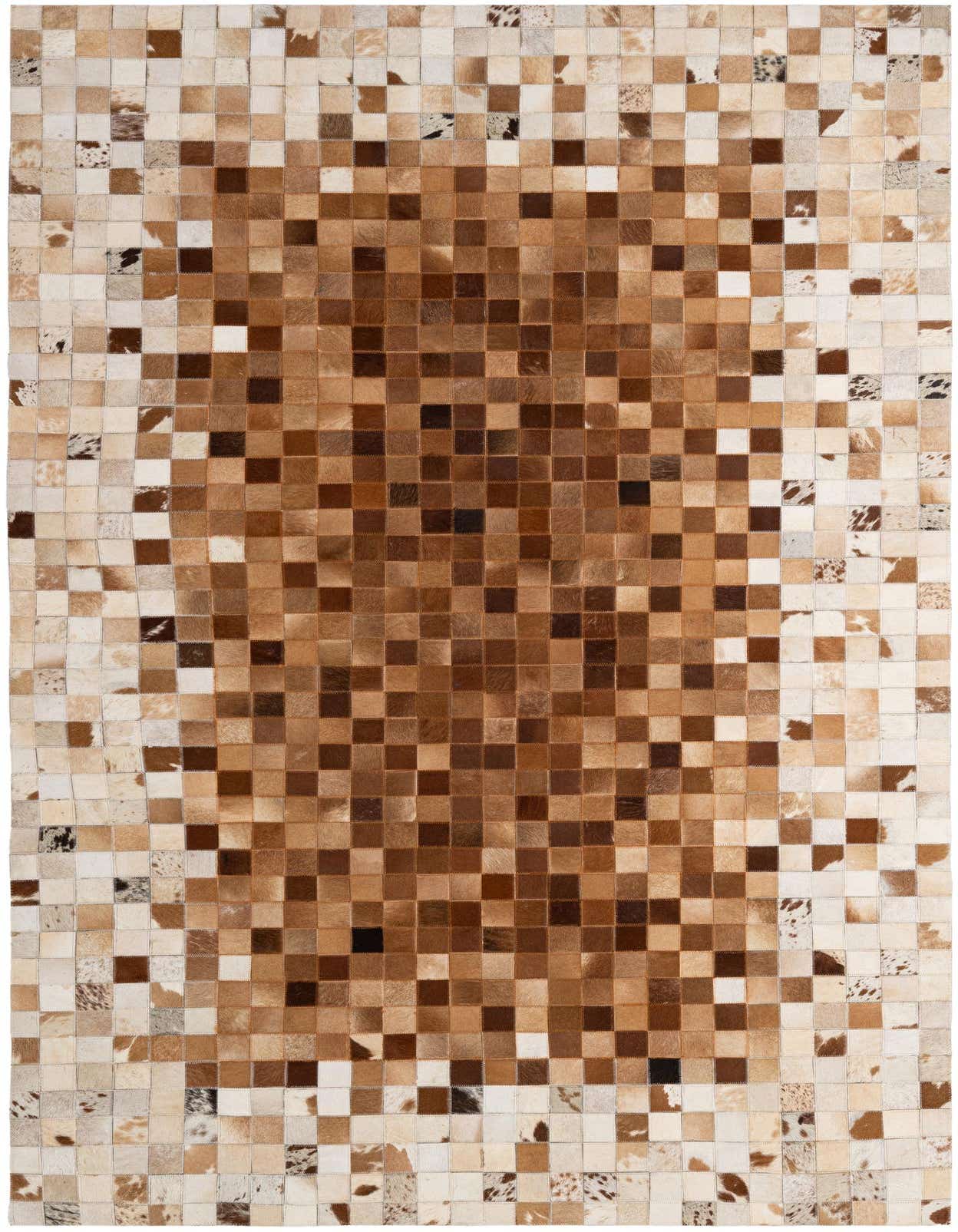 A rectangular 5x8 brown and tan patchwork cowhide rug, featuring a modern gradient from light to dark squares.