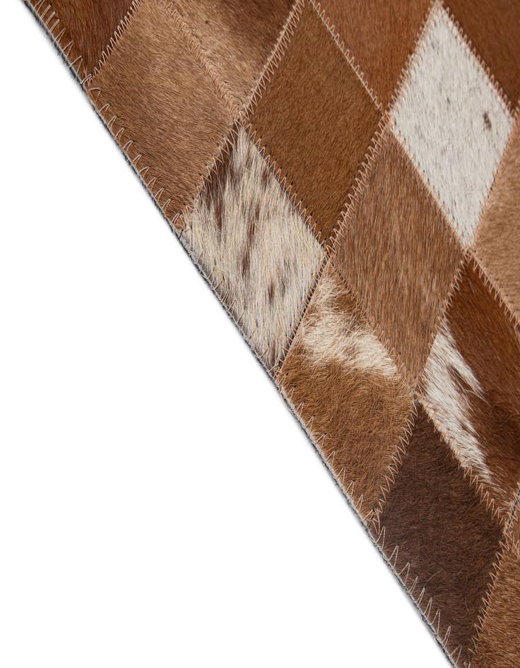 Detail image of  4' 11 x 7' 10 Cowhide - Patchwork Rug