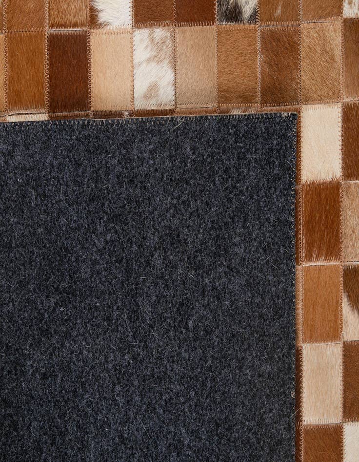 Detail image of  4' 11 x 7' 10 Cowhide - Patchwork Rug