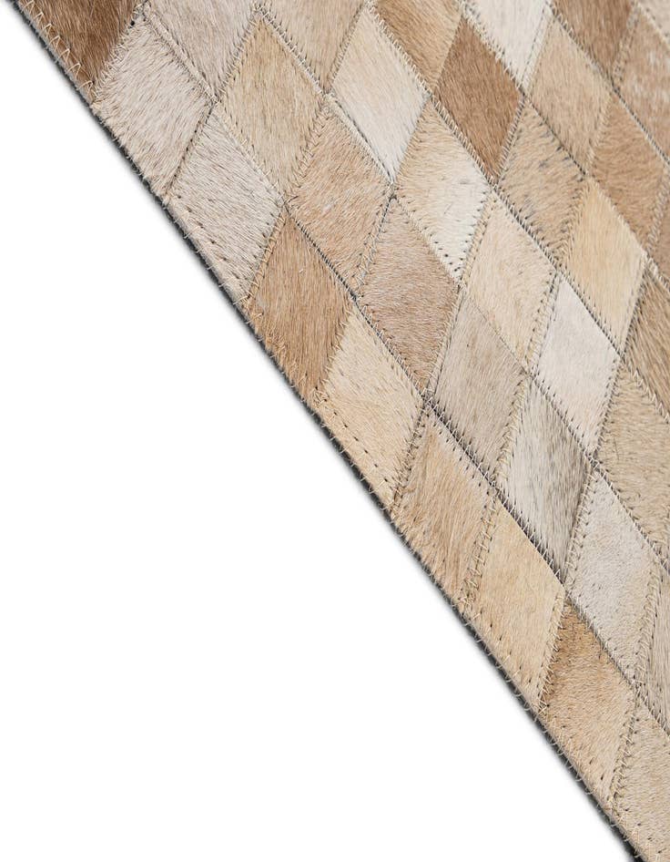 Detail image of  5' 1 x 7' 11 Cowhide - Patchwork Rug