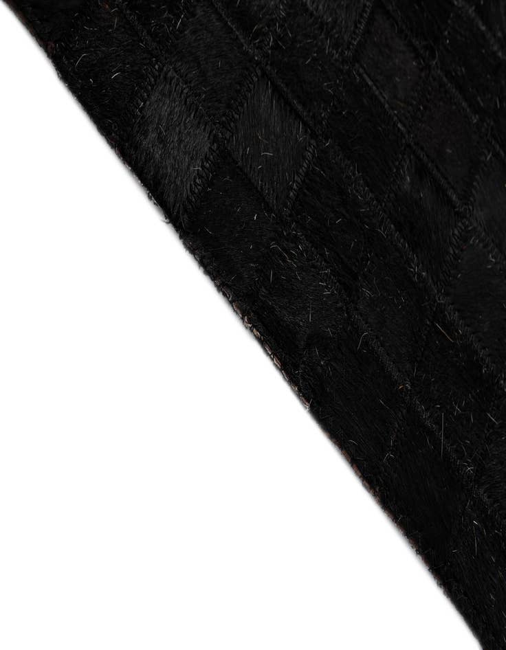 Detail image of  4' 11 x 7' 10 Cowhide - Patchwork Rug