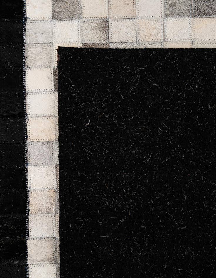 Detail image of  4' 11 x 7' 10 Cowhide - Patchwork Rug