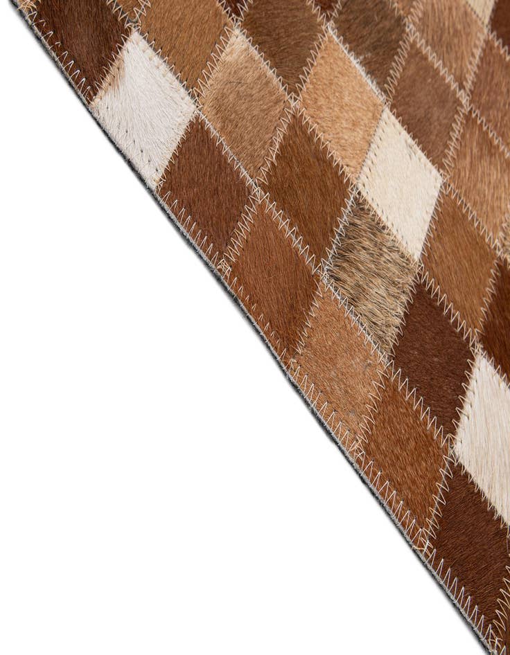Detail image of  5' 1 x 7' 11 Cowhide - Patchwork Rug