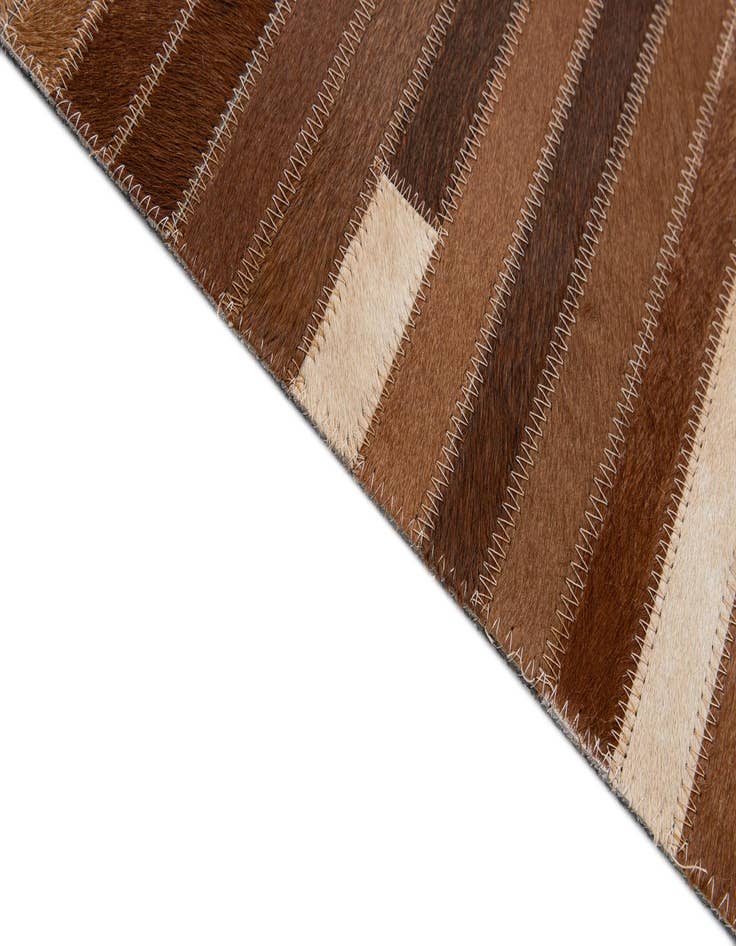 Detail image of  5' 1 x 7' 10 Cowhide - Patchwork Rug