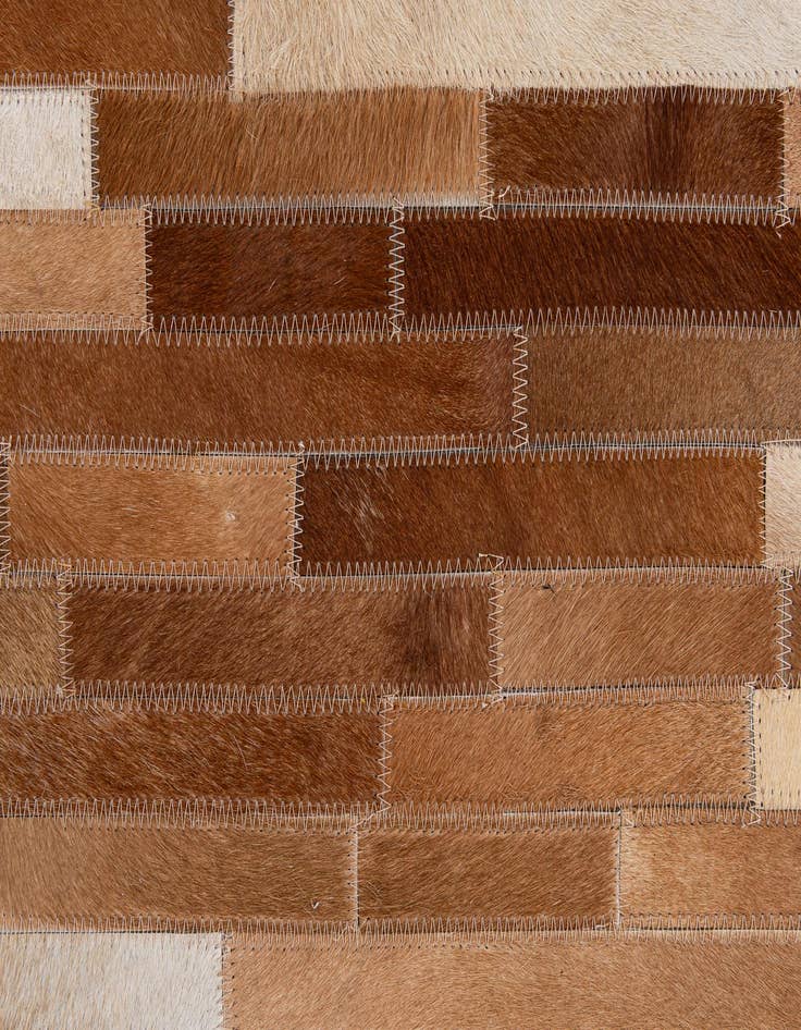 Detail image of  5' 1 x 7' 10 Cowhide - Patchwork Rug