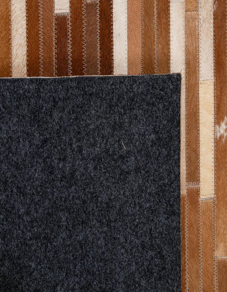 Detail image of  5' 1 x 7' 10 Cowhide - Patchwork Rug