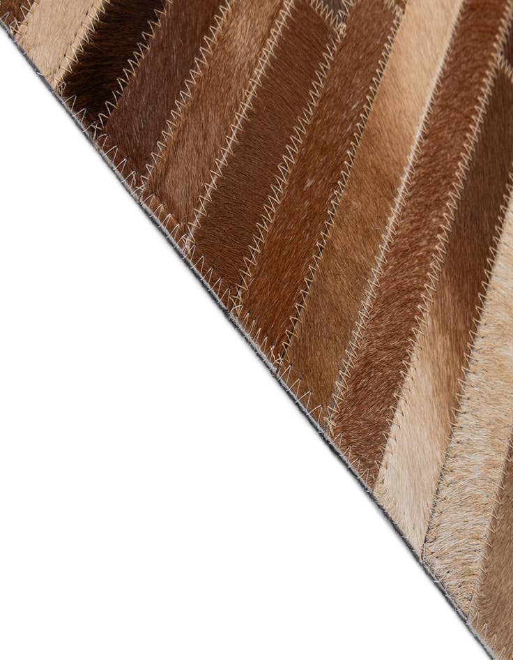 Detail image of  5' x 7' 11 Cowhide - Patchwork Rug