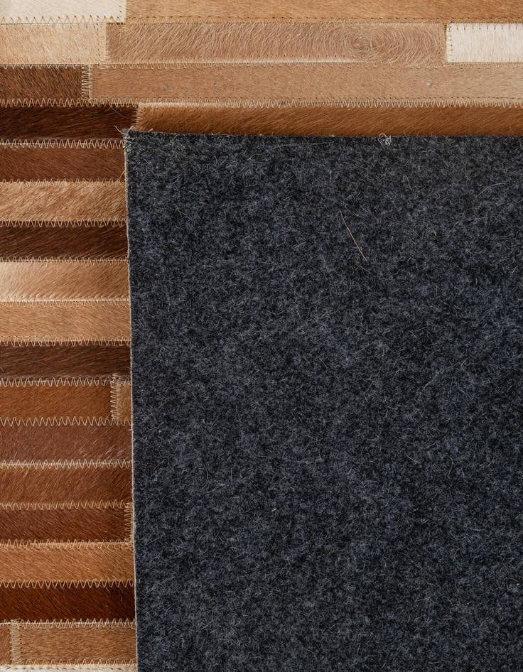 Detail image of  5' x 7' 11 Cowhide - Patchwork Rug