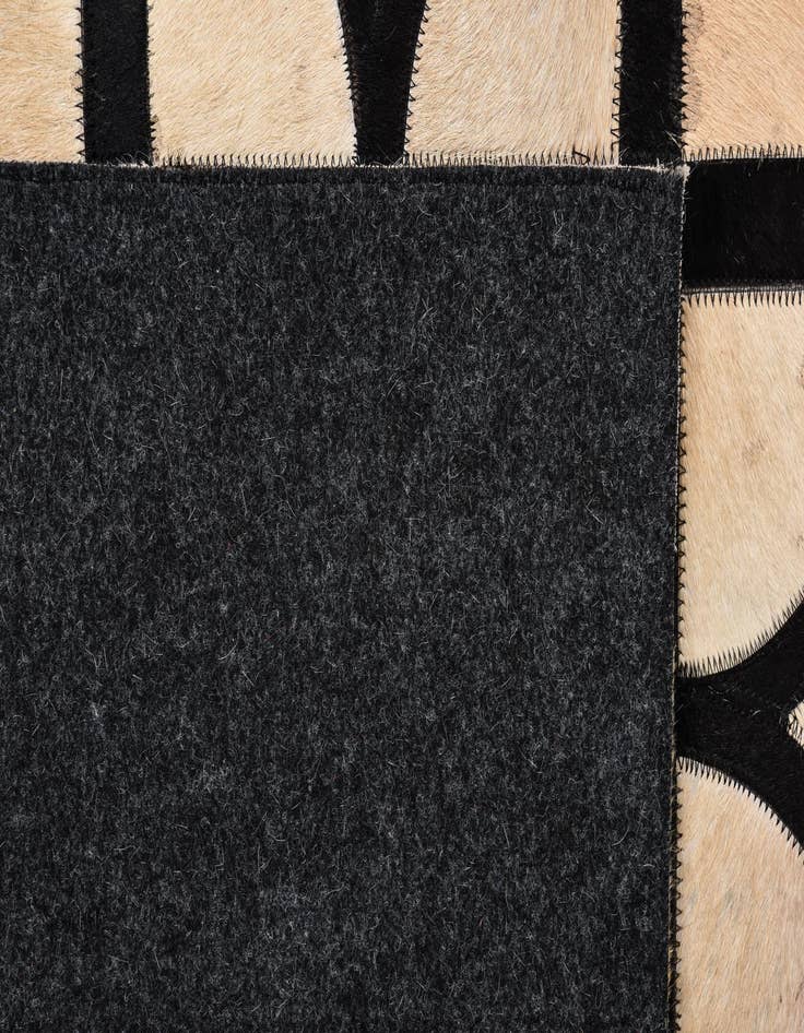 Detail image of  5' x 7' 10 Cowhide Leather Rug