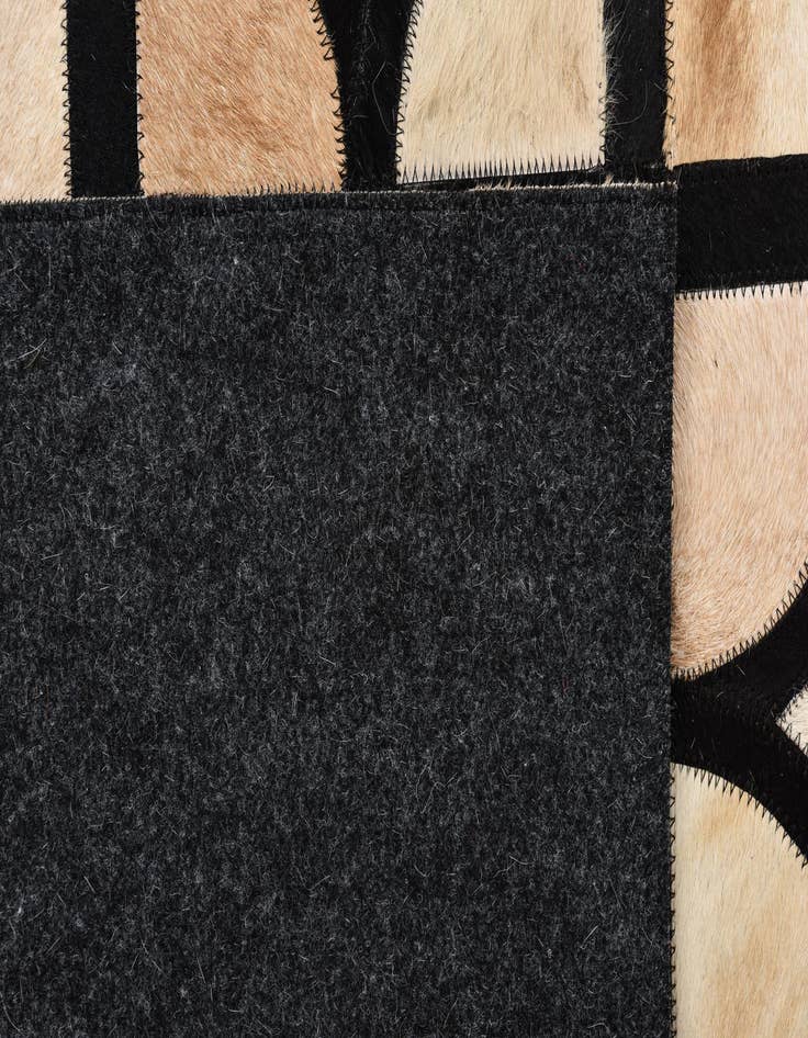 Detail image of  5' x 7' 10 Cowhide Leather Rug