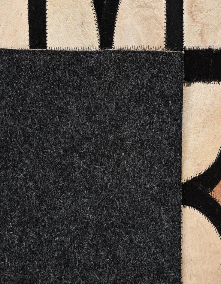 Detail image of  5' x 7' 10 Cowhide Leather Rug