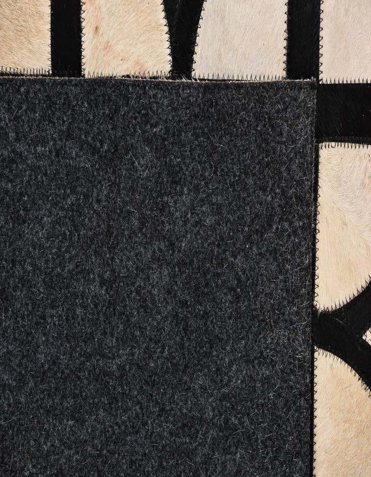 Detail image of  5' x 7' 10 Cowhide Leather Rug