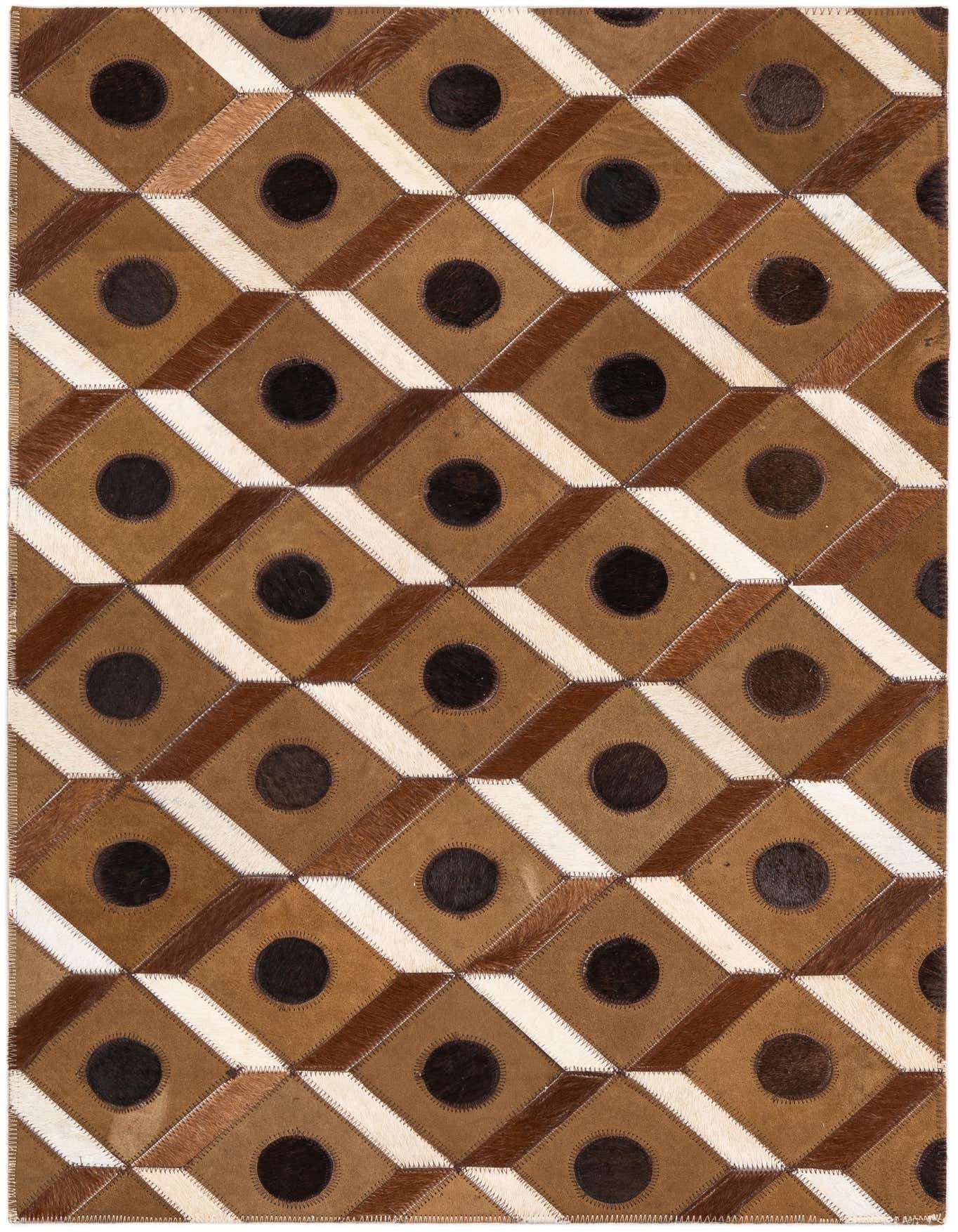 A 2x3 rectangular cowhide and leather rug with a modern geometric pattern in various shades of brown, tan, and dark brown circles.