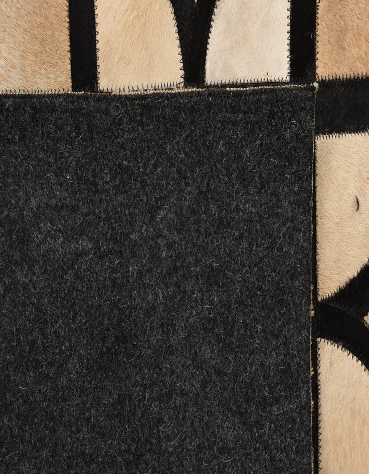 Detail image of  5' x 7' 9 Cowhide Rug