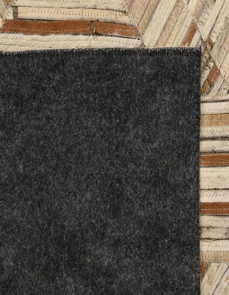 Detail image of  5' 1 x 7' 1 Cowhide Rug