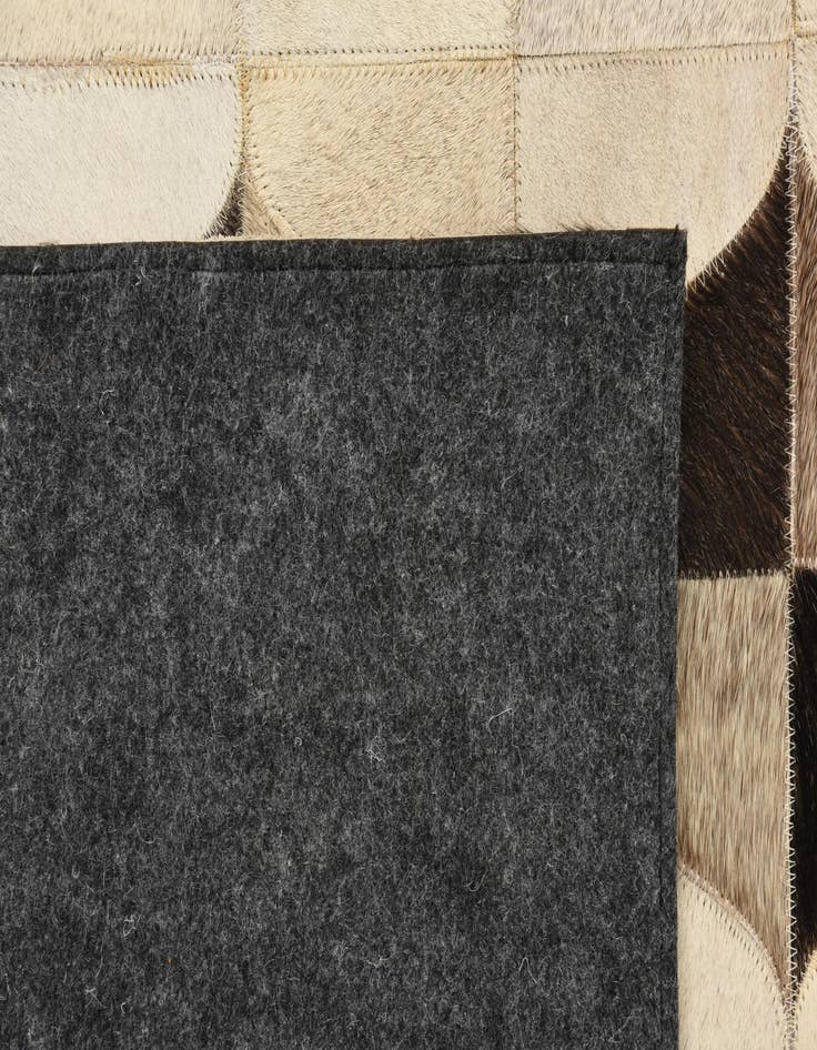 Detail image of  5' 2 x 7' 10 Cowhide Rug