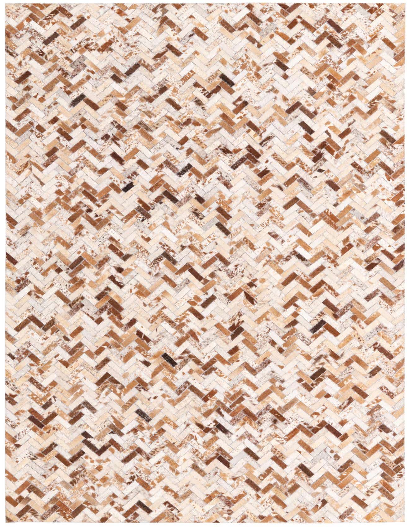 A 5x8 rectangular Cowhide rug in a modern herringbone pattern with varying shades of brown, tan, and cream.