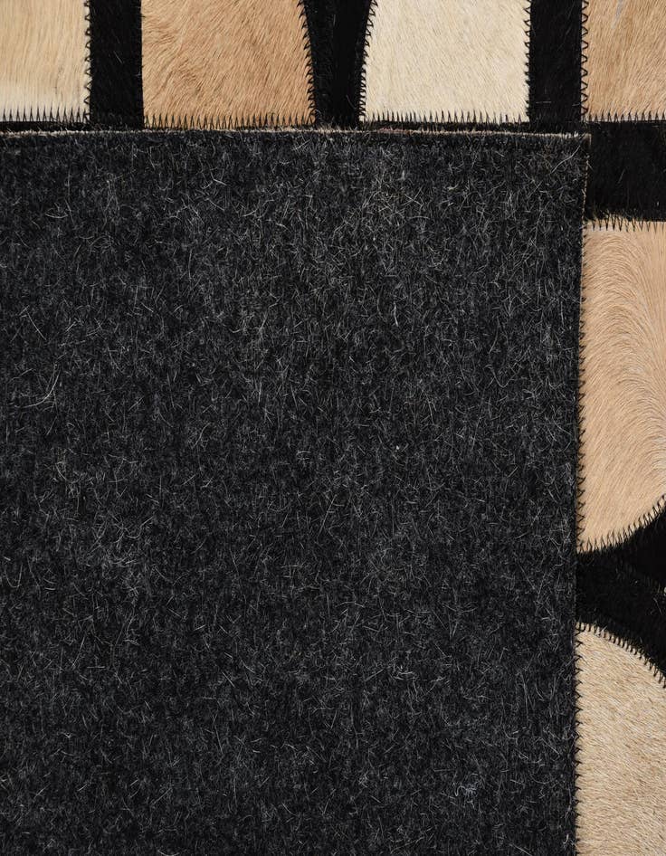 Detail image of  5' 1 x 7' 10 Cowhide Rug